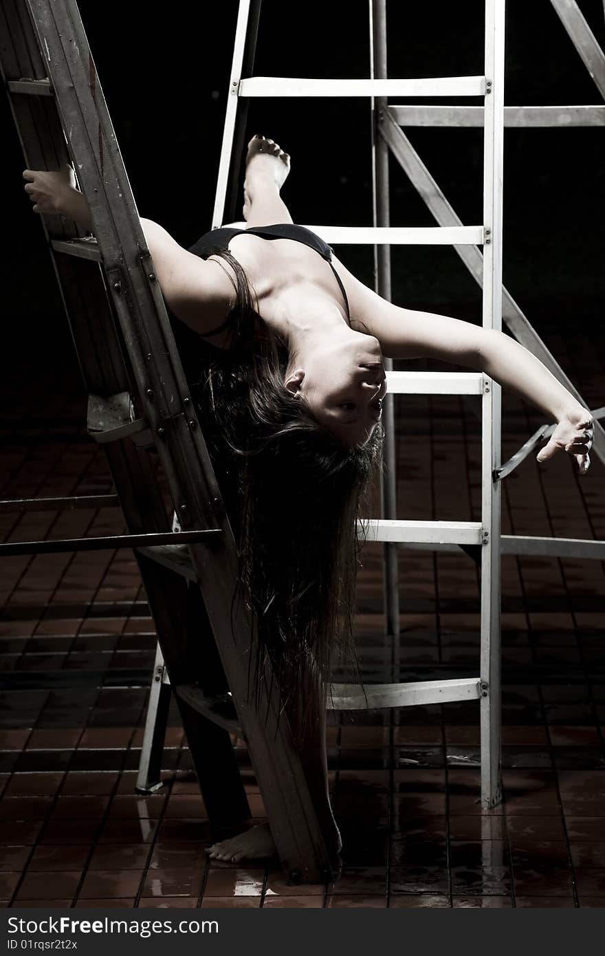 Ballet dancer on ladders