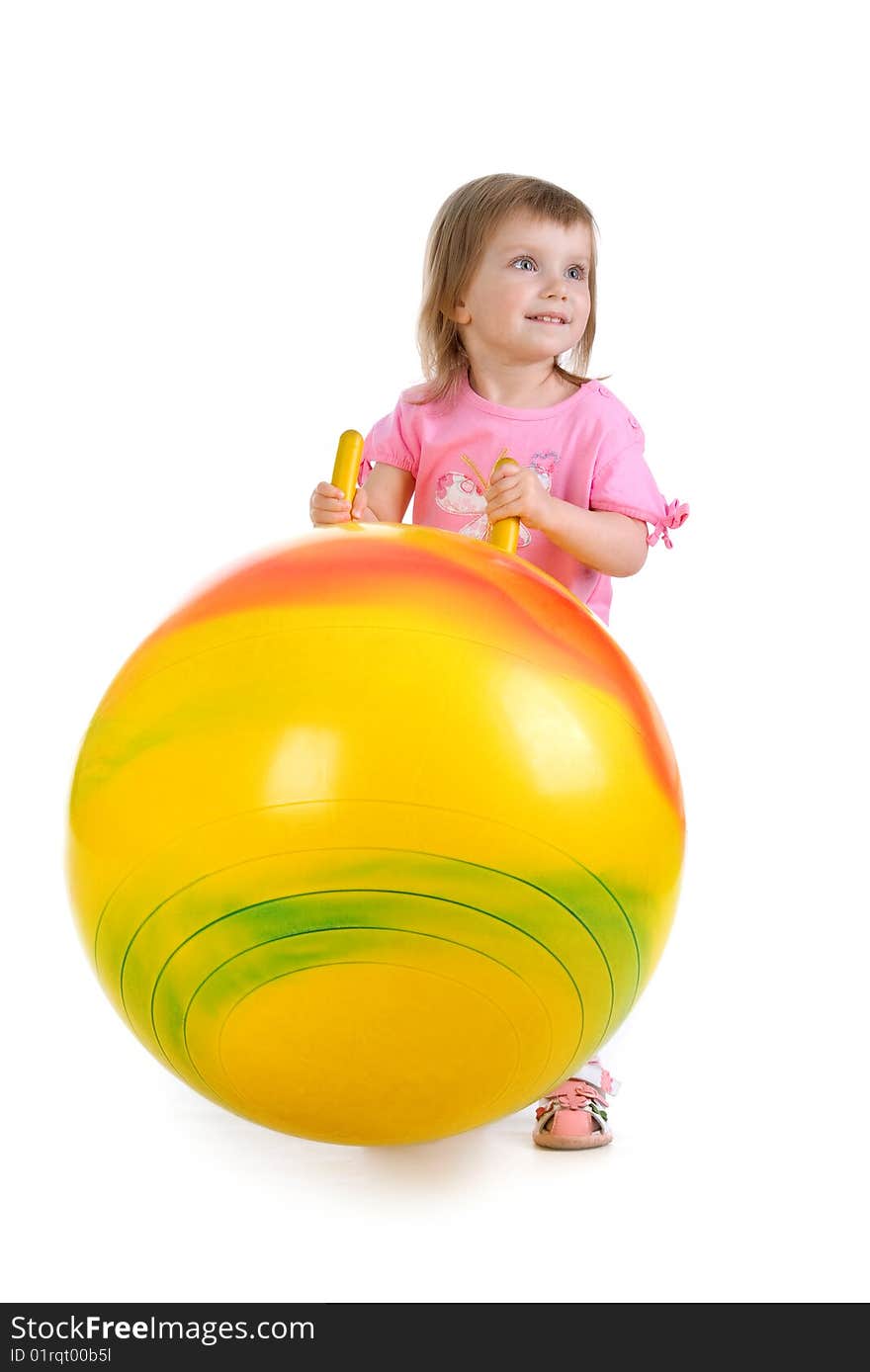 Little girl and big yellow ball on white background