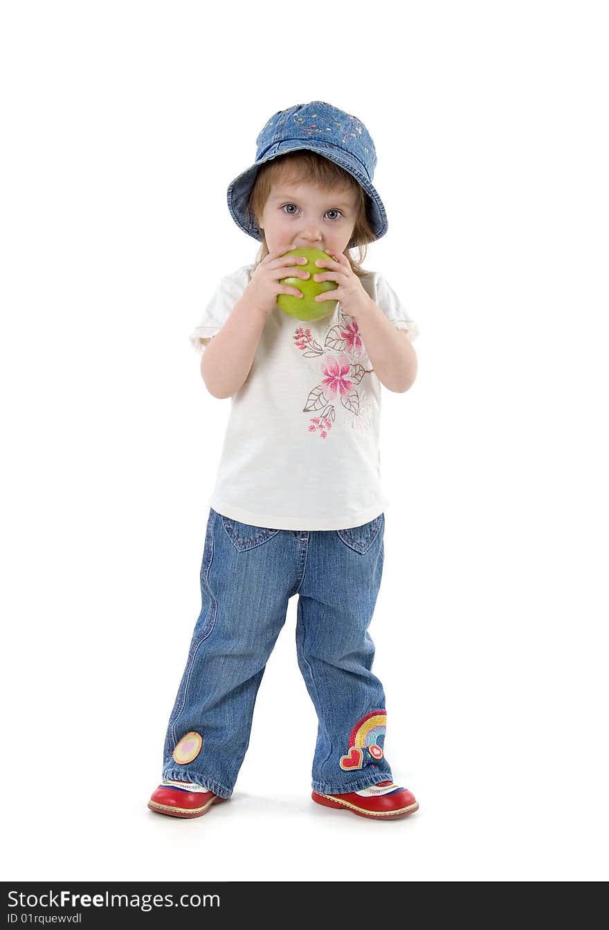 Little girl with green apple isolated on white background