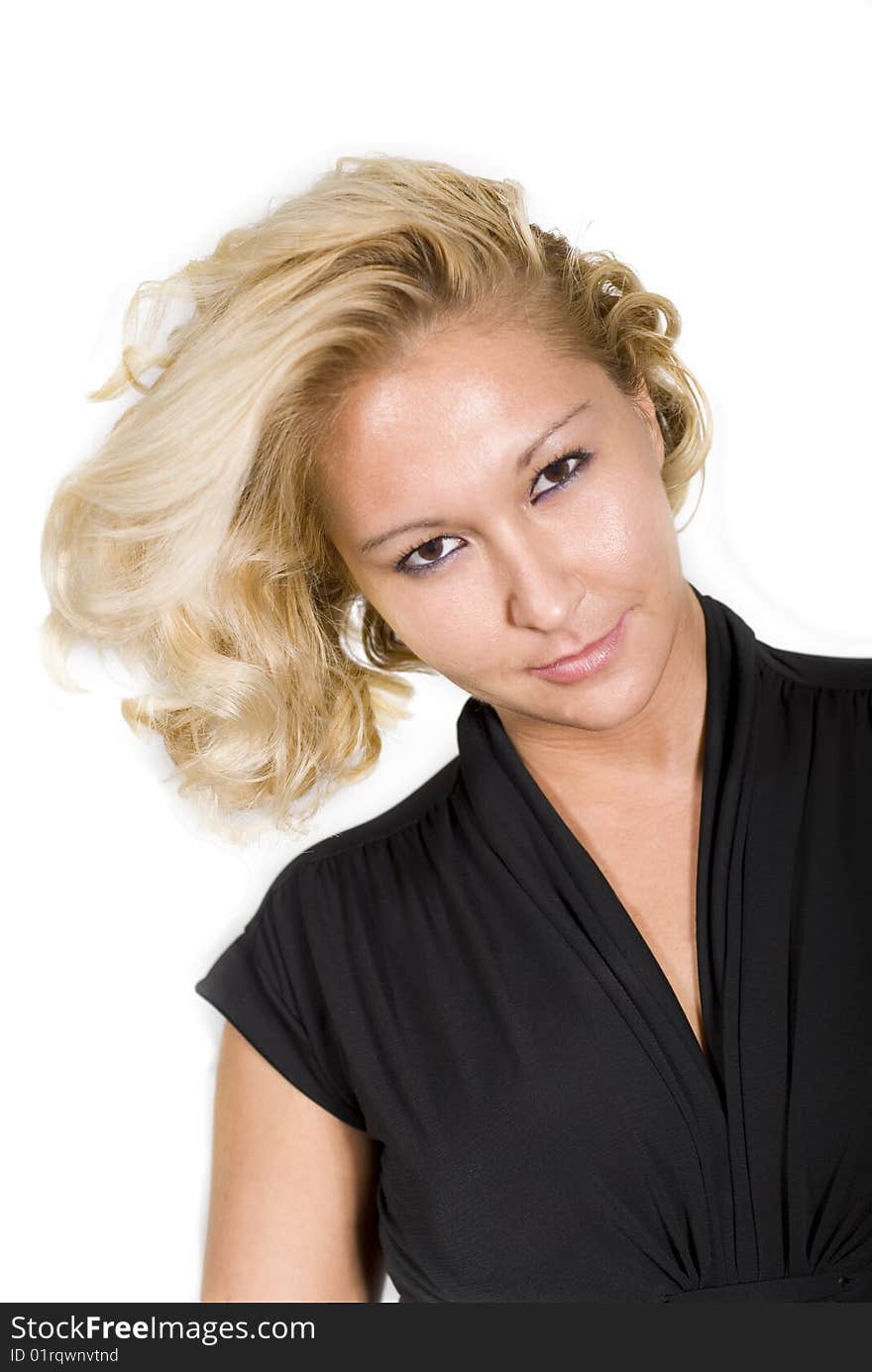 Young woman with a blonde hair on a with seamless background. Close up.