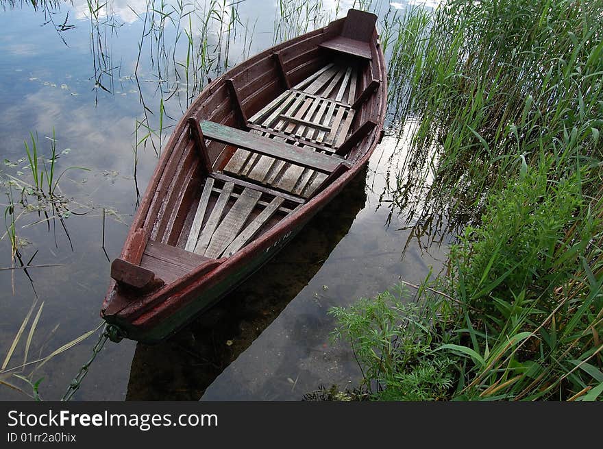 Lake and boat at summer time. Lake and boat at summer time