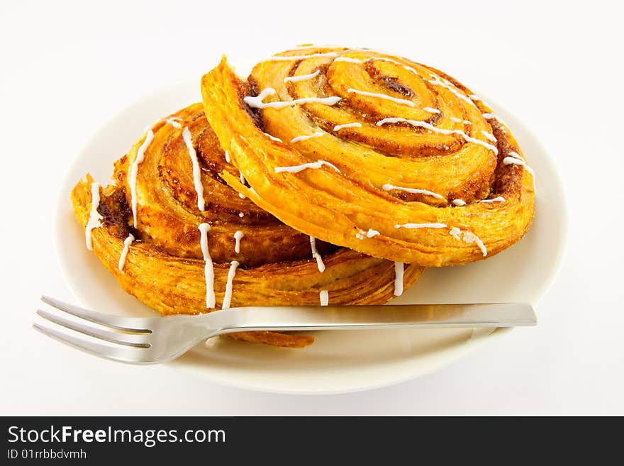 Two Cinnamon Buns and Fork