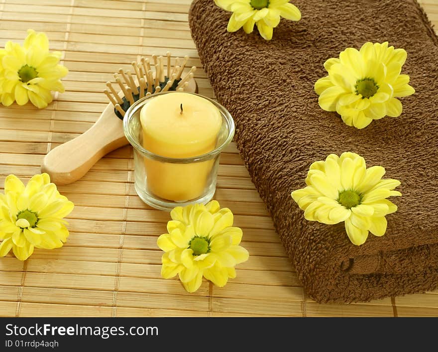 Spa background. towel, flowers and candle