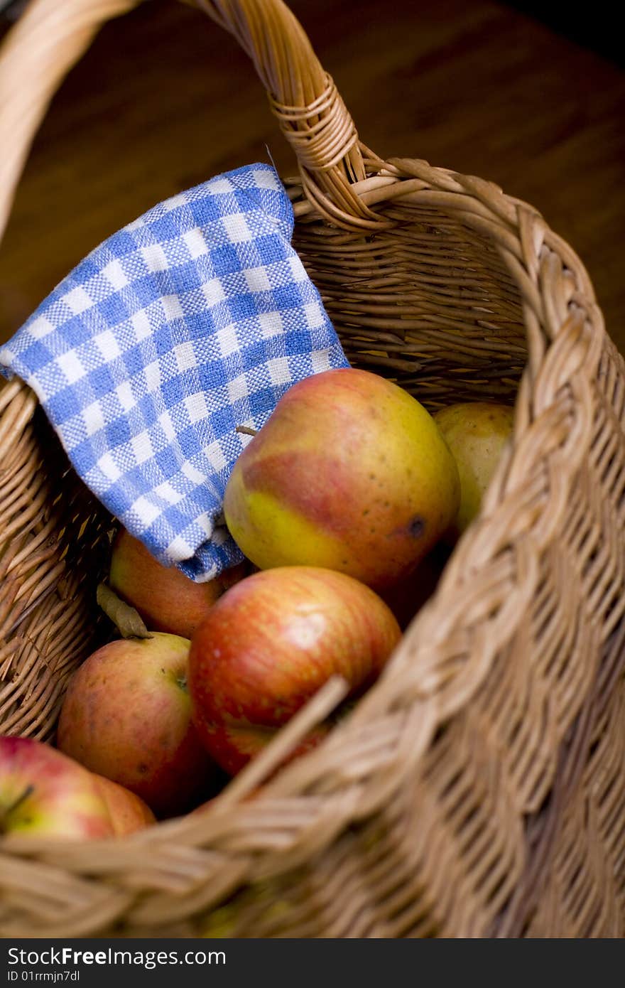 Wooden pan full of apples in kitchen. Wooden pan full of apples in kitchen