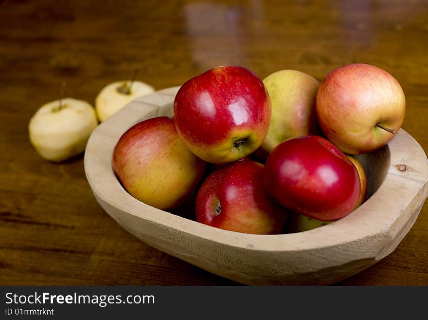 Wooden pan full of apples in kitchen. Wooden pan full of apples in kitchen