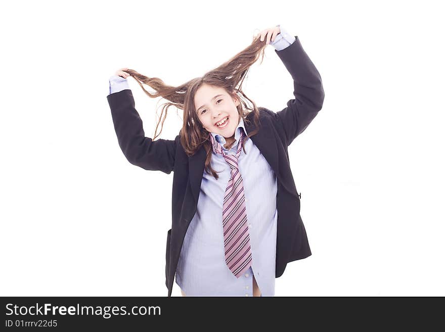 A beautiful and young girl playing with adult's clothes and with her hair. A beautiful and young girl playing with adult's clothes and with her hair