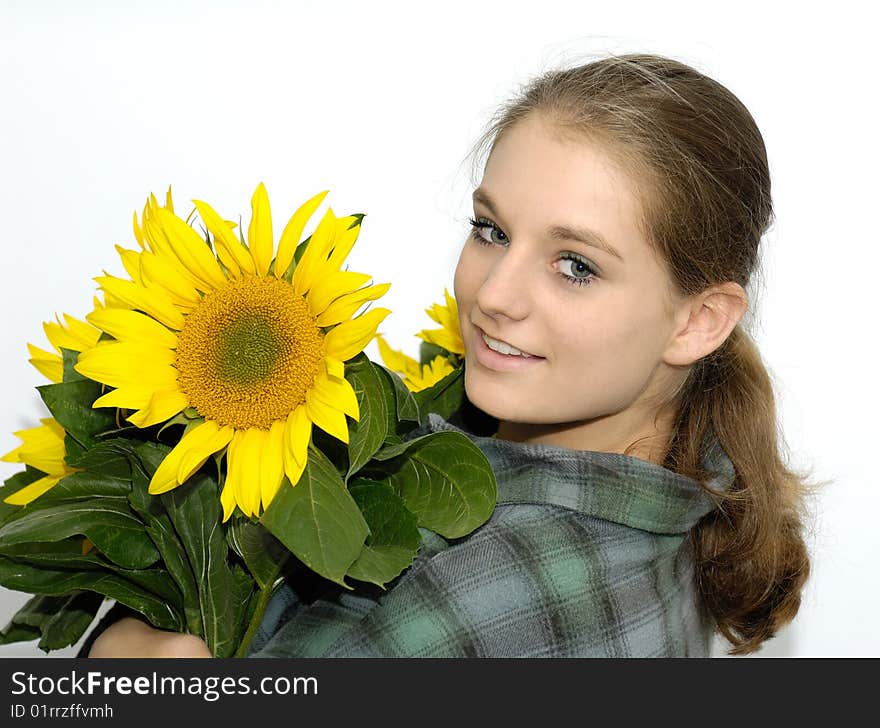 Young woman with sunflowers