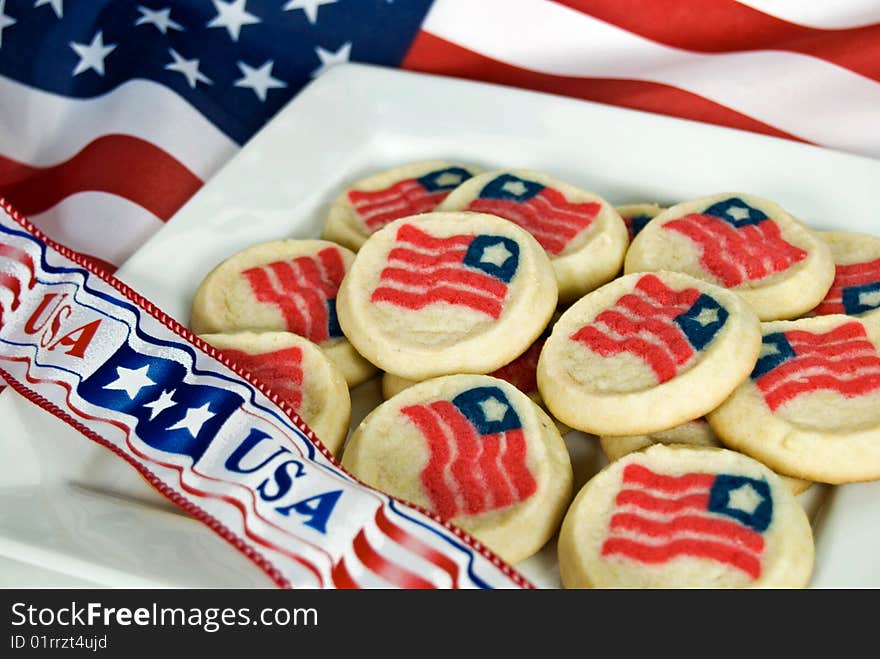 Flag sugar cookie on a flag with ribbon. Flag sugar cookie on a flag with ribbon.