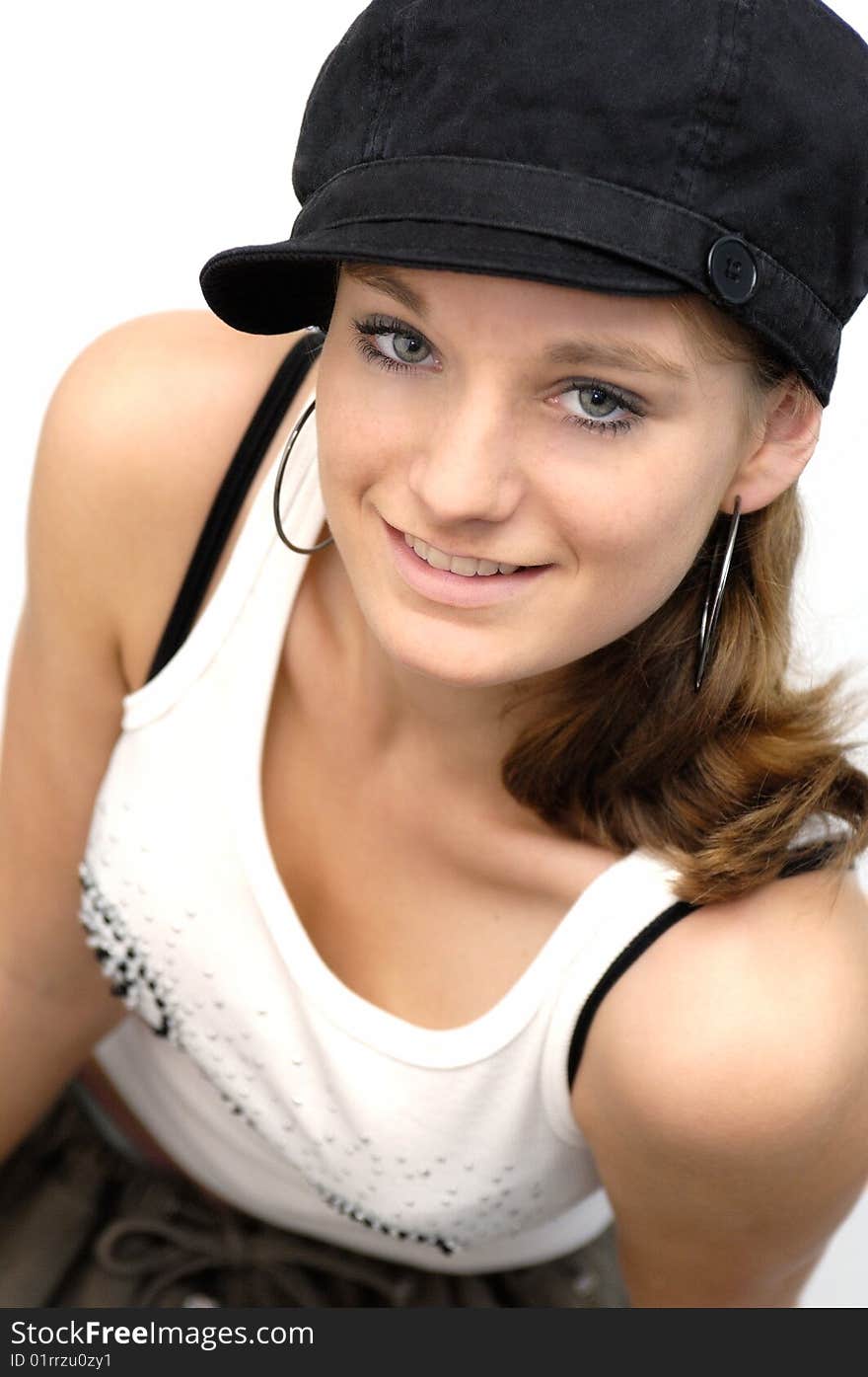 Young woman with black cap