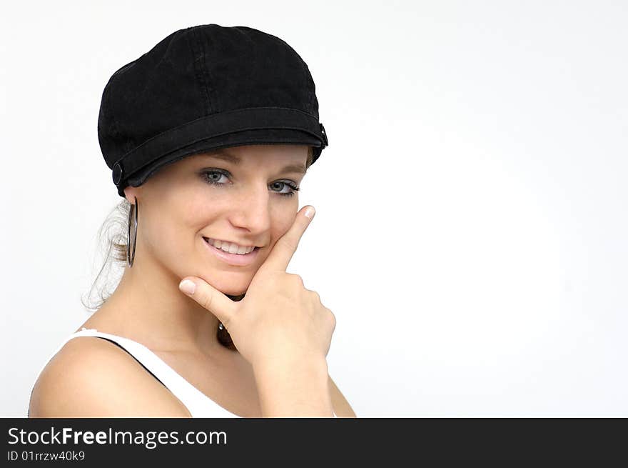 Young woman with black cap