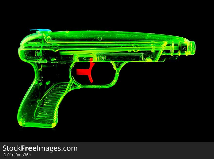 Green waterpistol in x-ray-stile on black ground. Green waterpistol in x-ray-stile on black ground