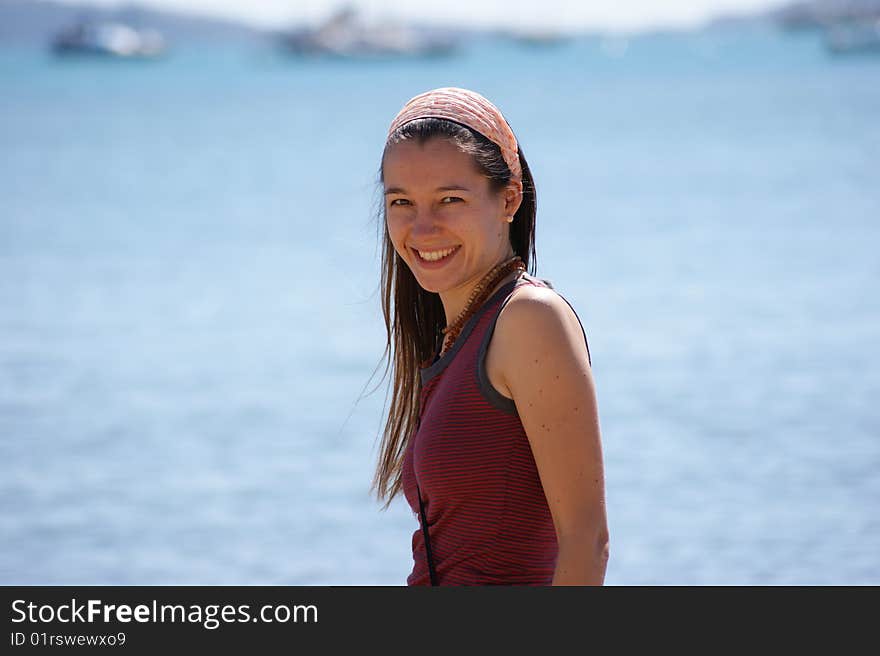 A portrait of girl at the sea.