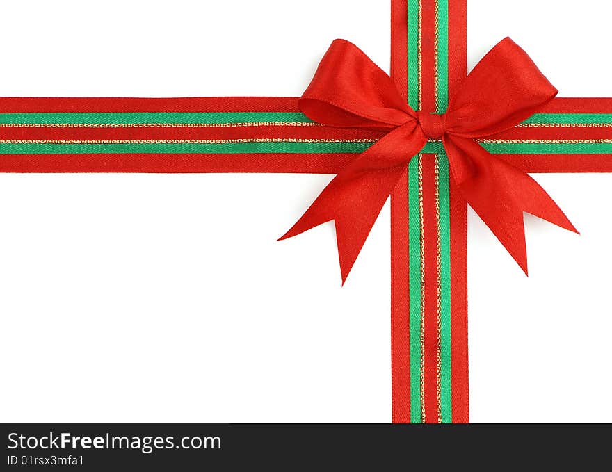 Red and green ribbon and bow isolated on white background