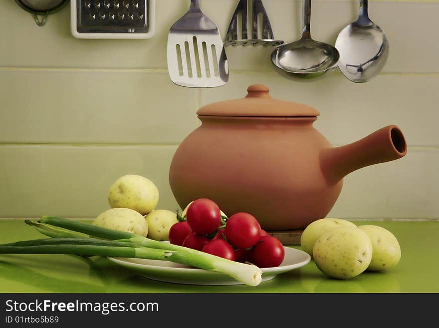 Vegetables and kitchen utensils composition. Vegetables and kitchen utensils composition