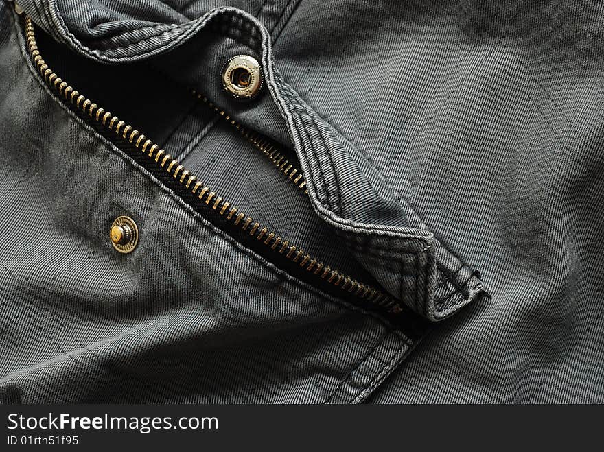 Pocket with zipper on some gray pants