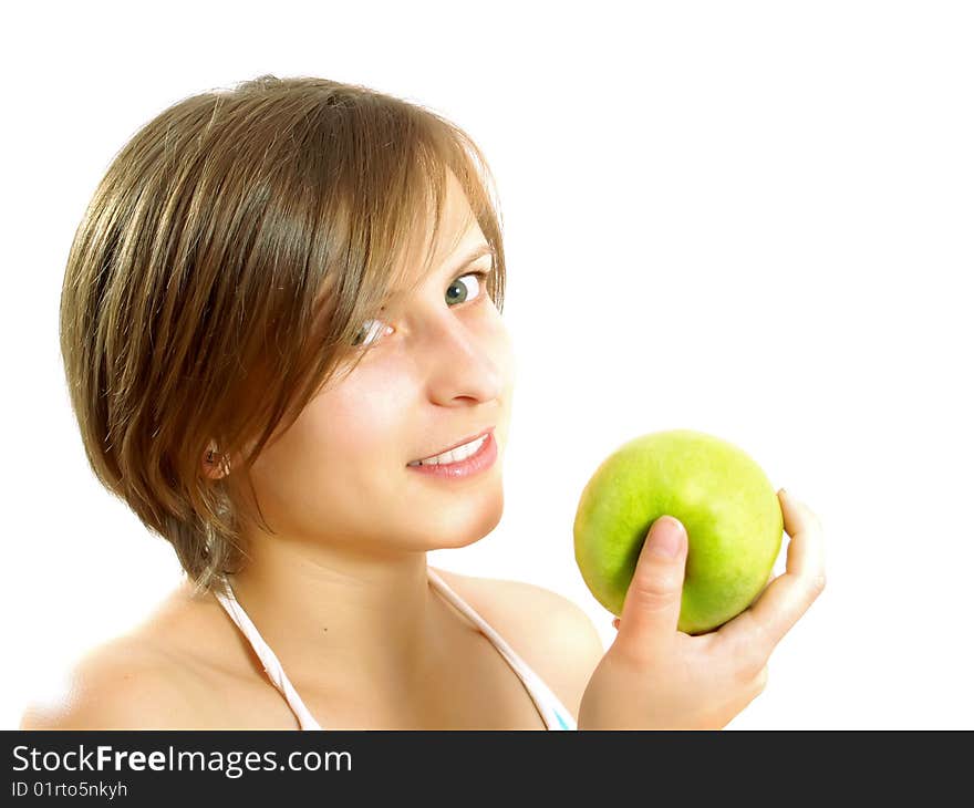 Attractive girl holding a green apple