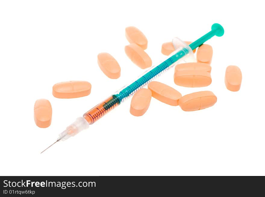 Syringe and tablets