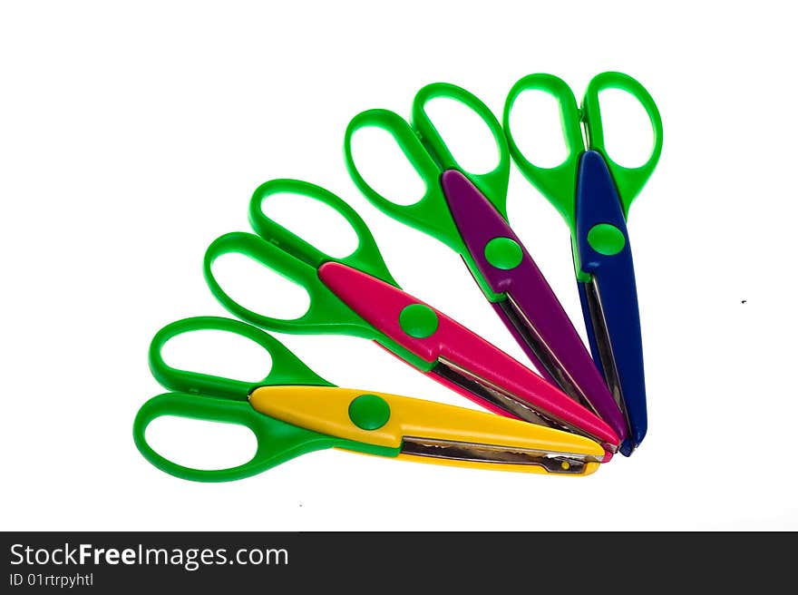 Colorful plastic scissors on white background