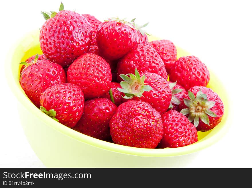 Strawberry in the bowl isolated