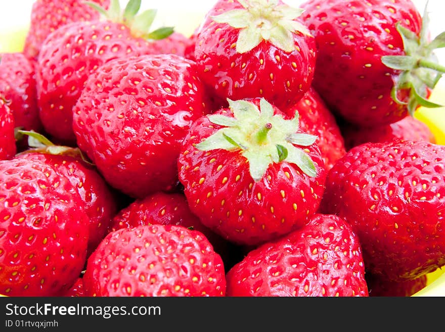 Strawberry in the bowl isolated