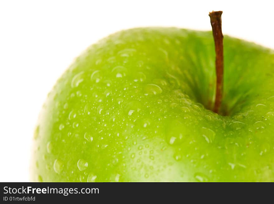 Green apple with drop water isolated on white