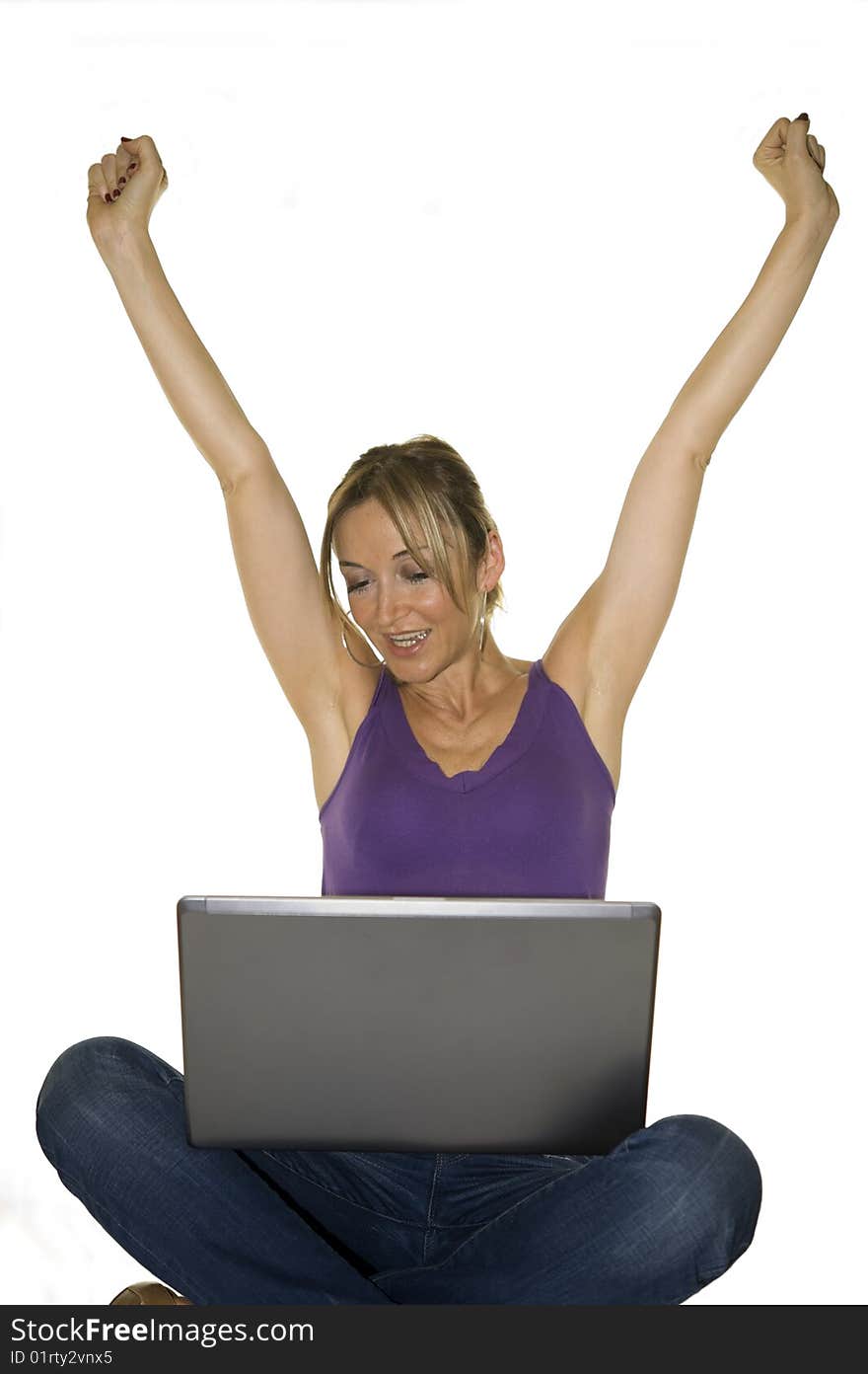 Young attractive woman in tshir blue jeans on professional laptop computer, on white backdrop. Young attractive woman in tshir blue jeans on professional laptop computer, on white backdrop