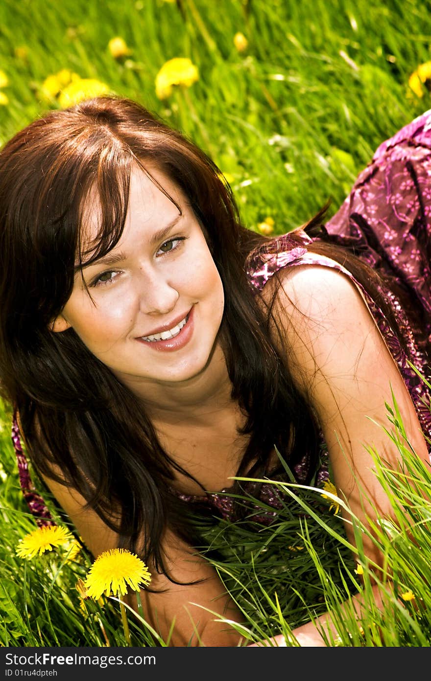 Happy woman on a green meadow. Happy woman on a green meadow