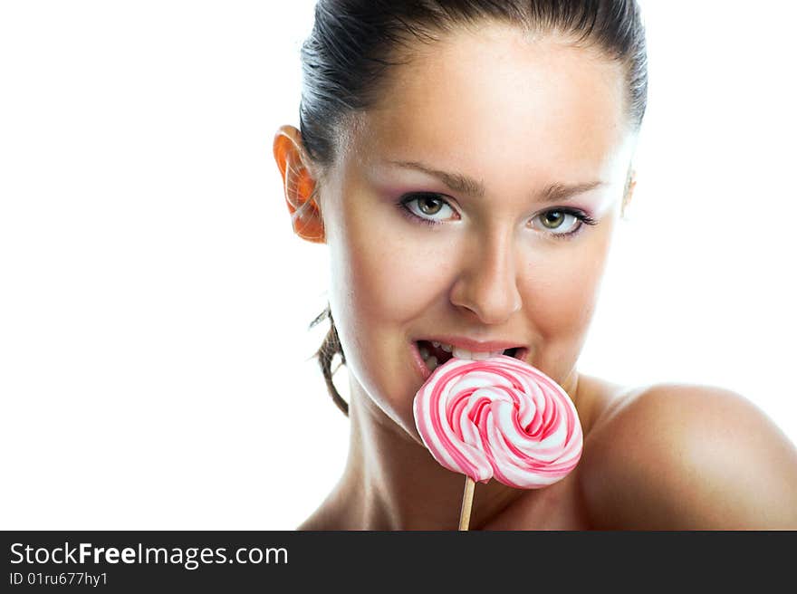 Smiling woman with a lollipop