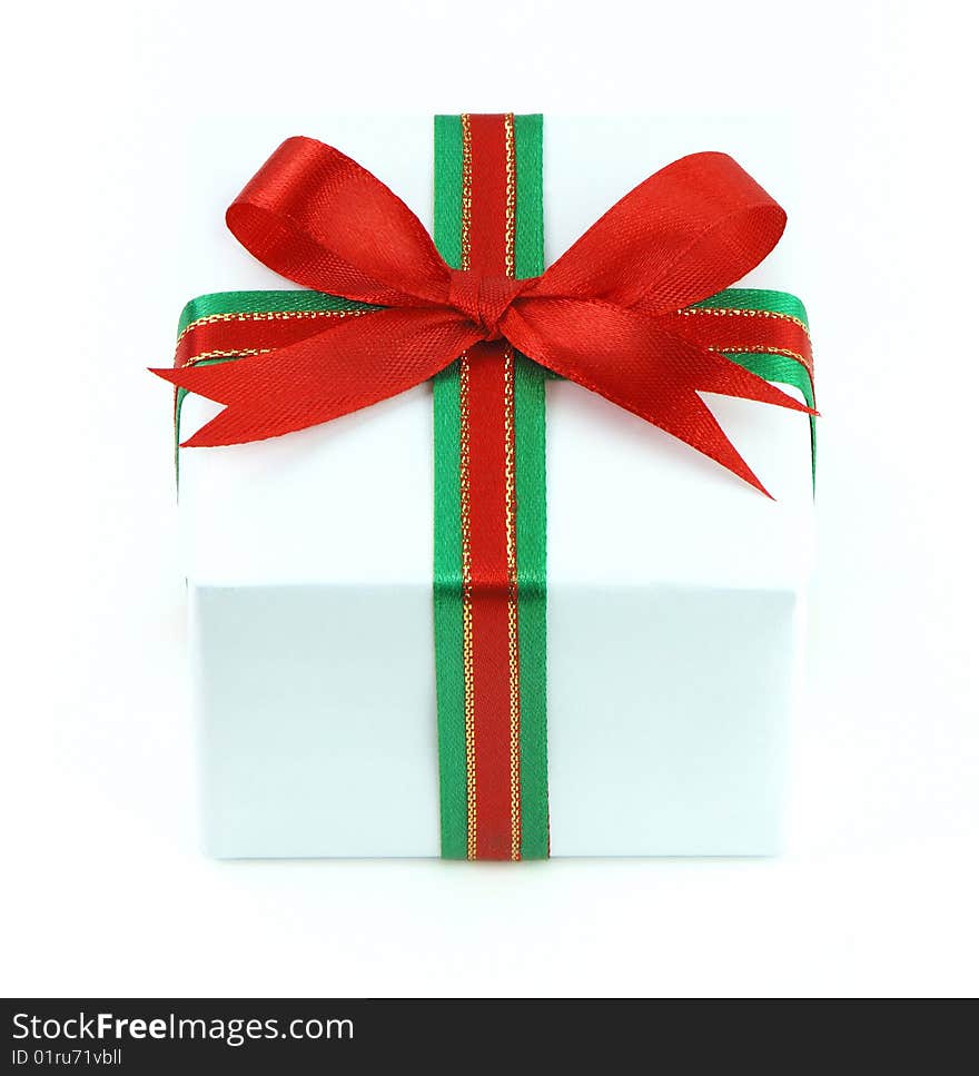 White gift box with red and green ribbon