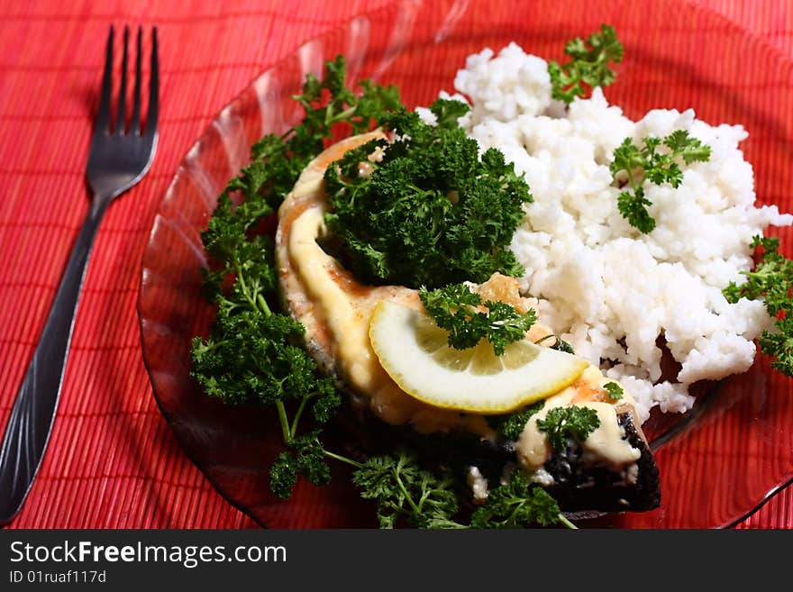 Plate with slice of salmon and rice. Plate with slice of salmon and rice