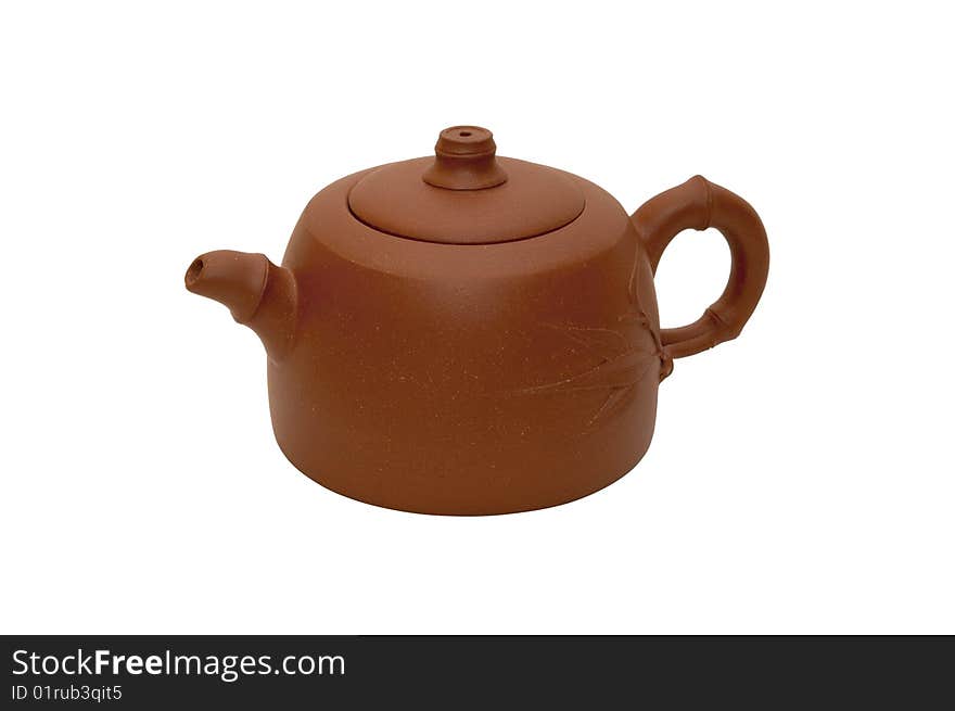 Close-up photo of brown teapot isolated over white background