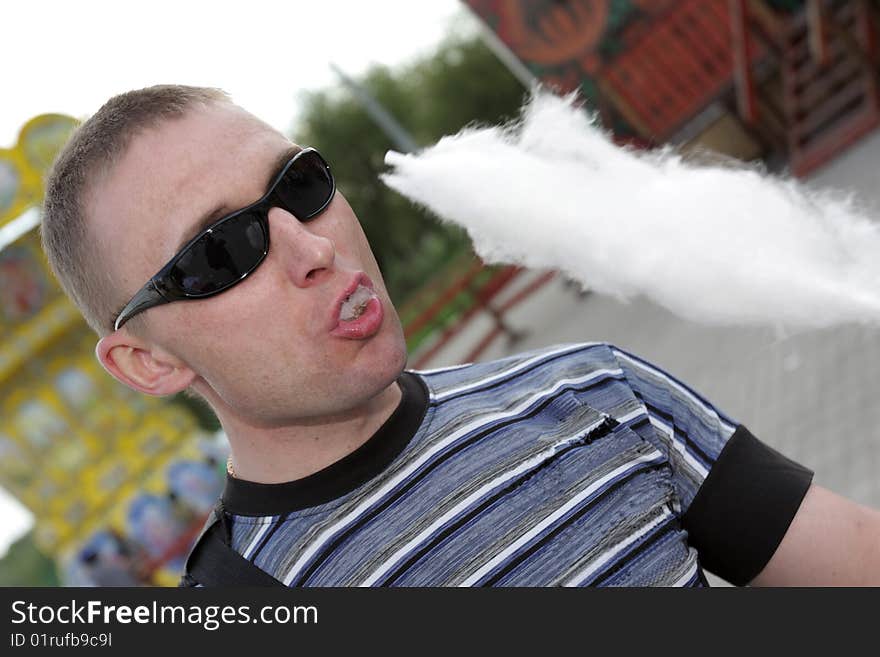 The hungry man with candy floss, outdoor