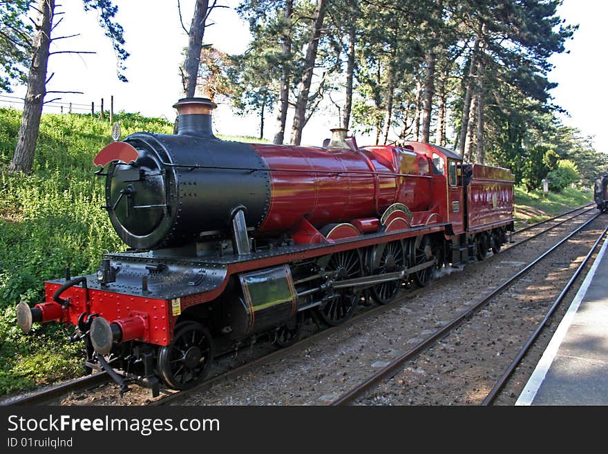 Steam train standing at platform. Steam train standing at platform