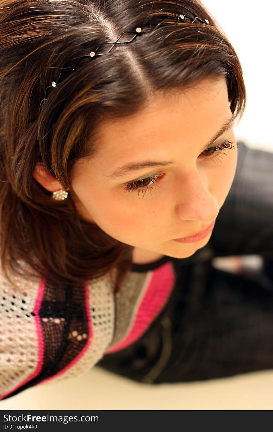 Thoughtful Sitting Girl