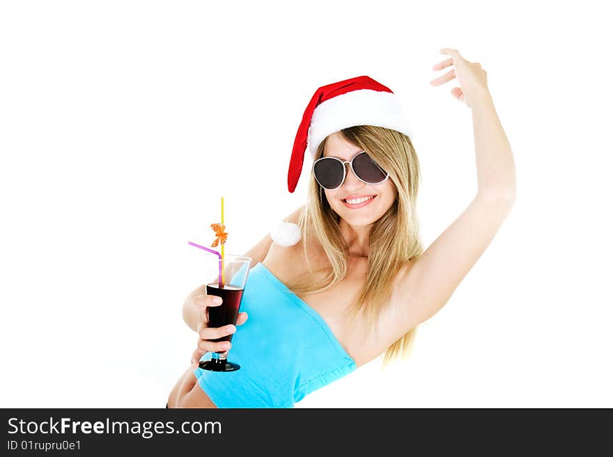 Santa girl with glass of juice over white