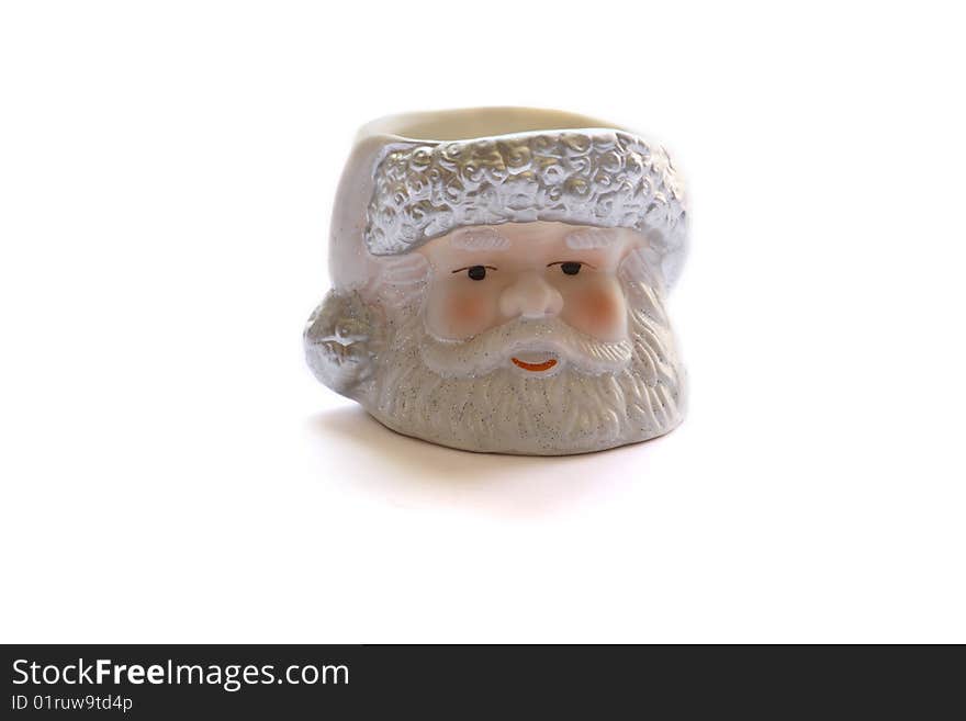 an ornamental candle of santa claus isolated on a white background. an ornamental candle of santa claus isolated on a white background