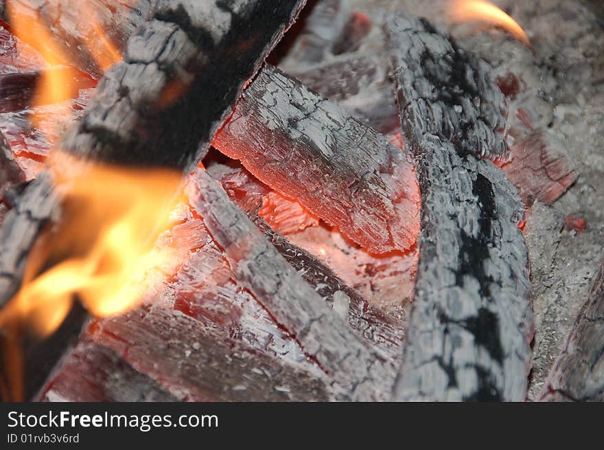 Glowing coals in a barbecue grill. Glowing coals in a barbecue grill