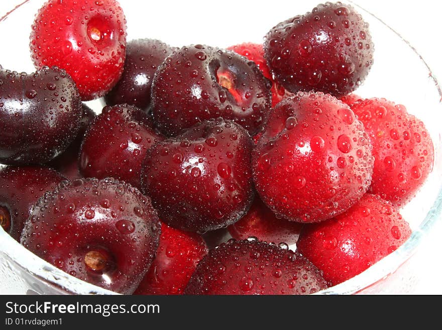 Sweet cherry on a white background, it is isolated. Sweet cherry on a white background, it is isolated