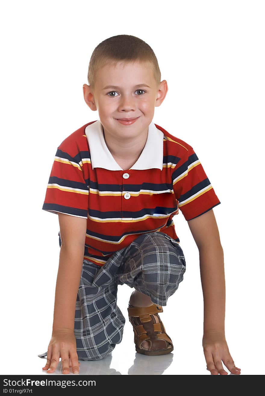 Portrait of the boy sitting on a floor. Portrait of the boy sitting on a floor