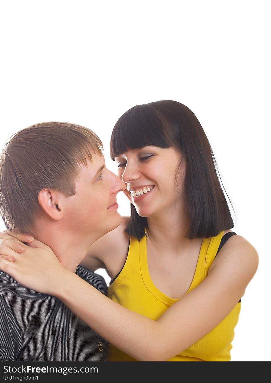 Portrait of young happy pair on a white background. Portrait of young happy pair on a white background