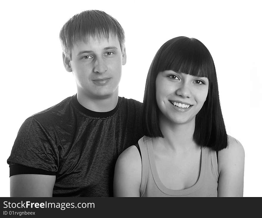 Portrait of young happy pair on a white background. Portrait of young happy pair on a white background