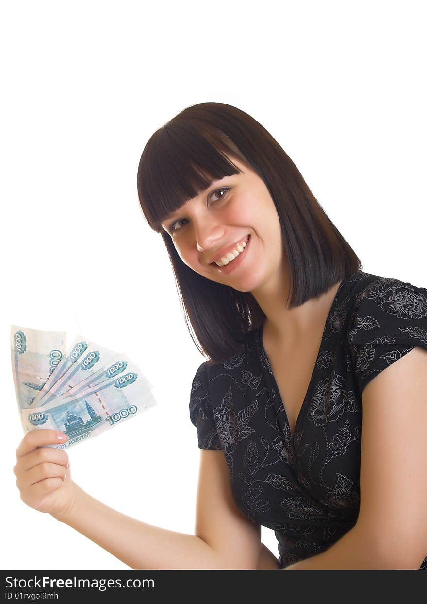 The young girl holds in hands Russian money for a white background. The young girl holds in hands Russian money for a white background