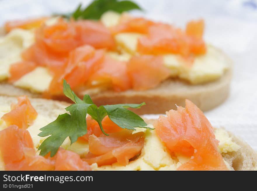 Sandwiches with a salmon, a butter and parsley. Sandwiches with a salmon, a butter and parsley.