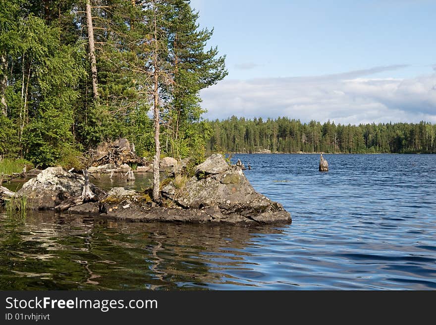 Landscape of Karelian lake and sky with clouds. Landscape of Karelian lake and sky with clouds