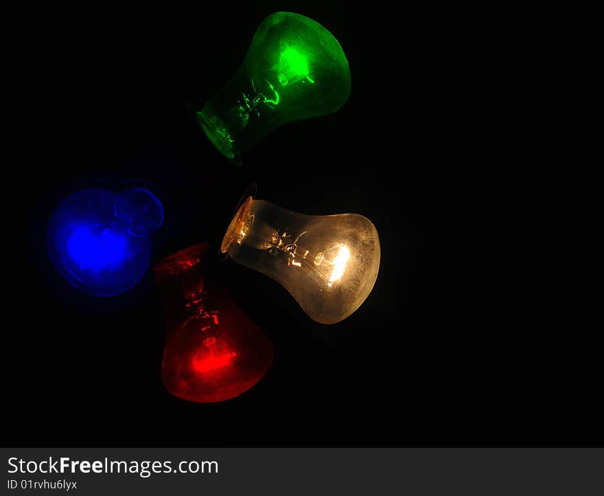 Light quantum is not f(R, G, B)! Color coordinates. Symbolistical humorous photo illustrating widespread opinion about existence of unambiguous math conversion from RGB-color coordinates into frequency function by means of light bulb basis.