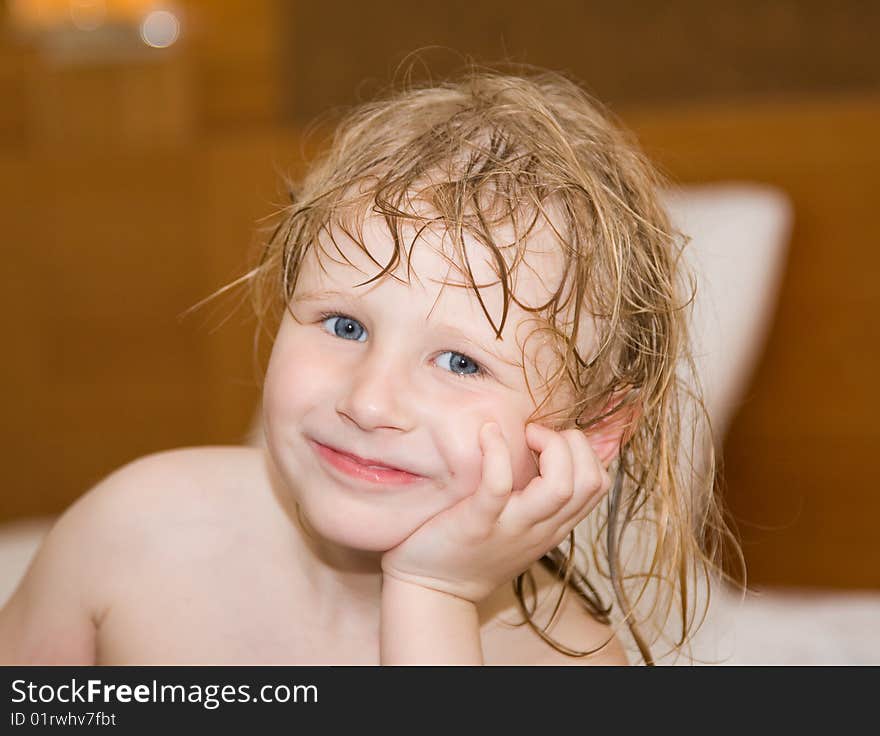 Beautiful little girl after swimming