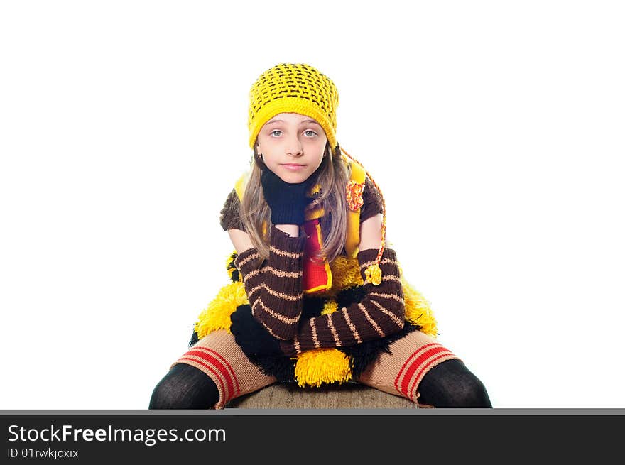 Portrait of the girl in a costume on a white background