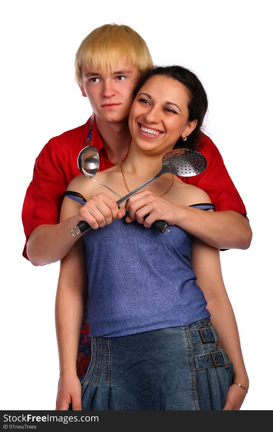 Young Man And Woman Embraces With Utensil