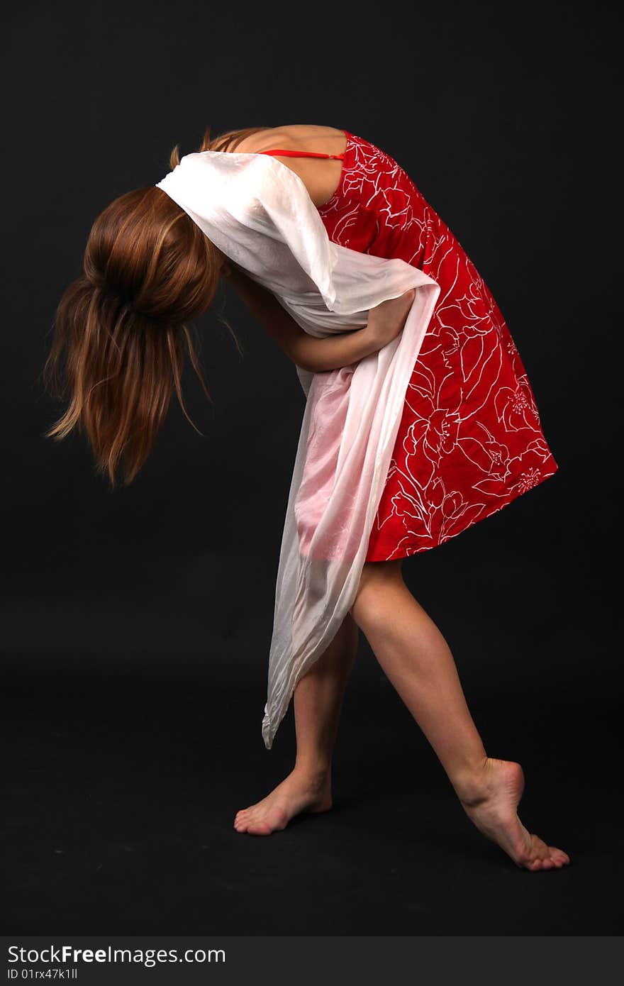 Tired young woman in red-white outfit. Tired young woman in red-white outfit