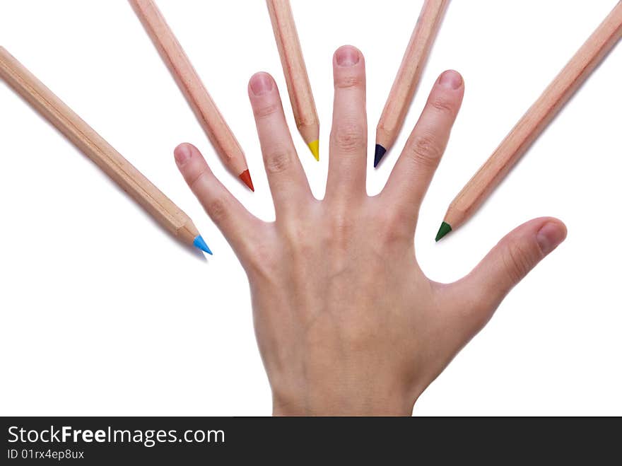 Colorful pencils around a hand isolated on white